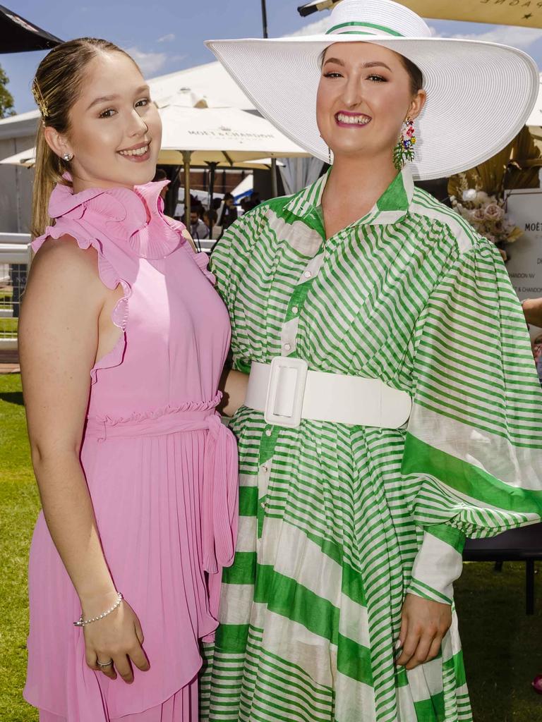 Mia and Neva Eisenmenger at Doomben Racecourse for Melbourne Cup Day. Socials: Damien Anthony Rossi | Pictures: Jared Vethaak