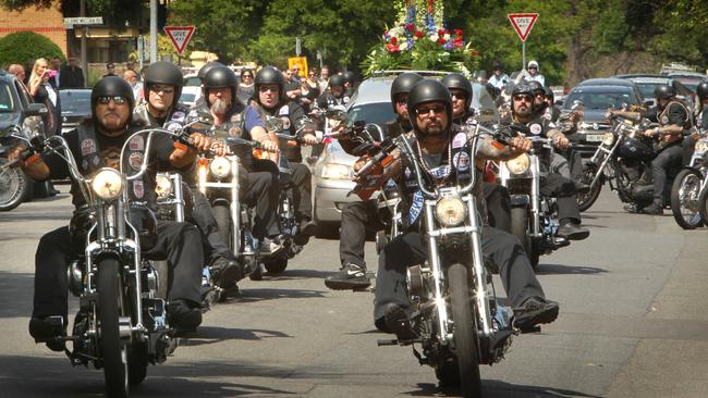 Rebels members surround the hearse carrying James Sean 'Pappa' Petterson.