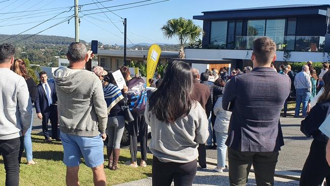 The market has settled but crowds can still be found at Brisbane auctions. Picture: Debra Bela