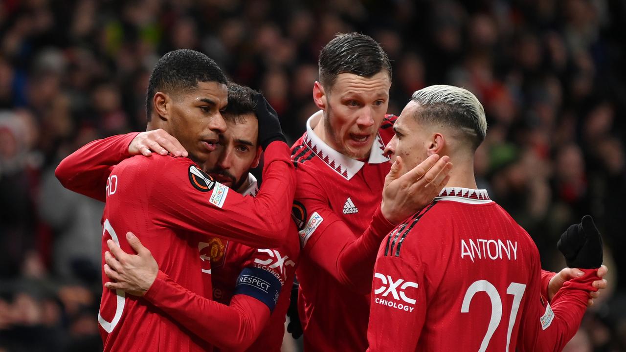 MANCHESTER, ENGLAND – MARCH 09: Marcus Rashford of Manchester United celebrates with teammates Bruno Fernandes, Wout Weghorst and Antony after scoring the team's first goal during the UEFA Europa League round of 16 leg one match between Manchester United and Real Betis at Old Trafford on March 09, 2023 in Manchester, England. (Photo by Michael Regan/Getty Images)