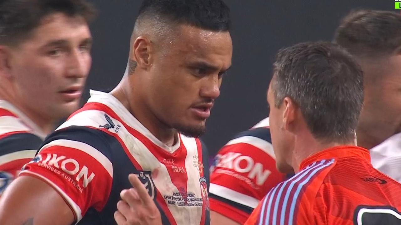 Spencer Leniu speaks with referee Adam Gee. Photo: Fox League