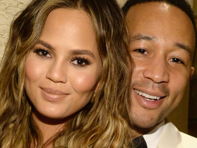 LAS VEGAS, NV - DECEMBER 02: Model Chrissy Teigen and recording artist John Legend pose backstage during "Sinatra 100: An All-Star GRAMMY Concert" celebrating the late Frank Sinatra's 100th birthday at the Encore Theater at Wynn Las Vegas on December 2, 2015 in Las Vegas, Nevada. The show will air on CBS on December 6. (Photo by Kevin Mazur/WireImage)