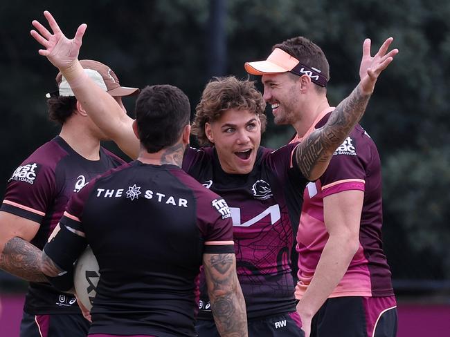 All smiles for Reece Walsh and Corey Oates. Picture: Liam Kidston