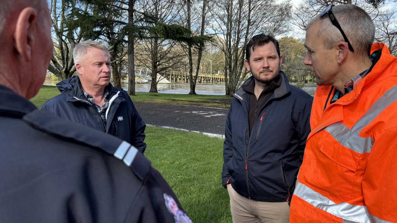 Premier Jeremy Rockliff and Police, Fire and Emergency Management Minister Felix Ellis speaking with SES volunteers along the Meander River at Deloraine. Picture: Simon McGuire.