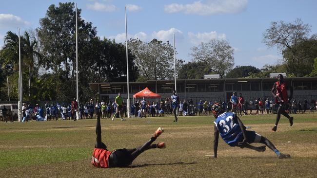 Players in action during the Tiwi Island Football League grand final between Tuyu Buffaloes and Pumarali Thunder. Picture: Max Hatzoglou