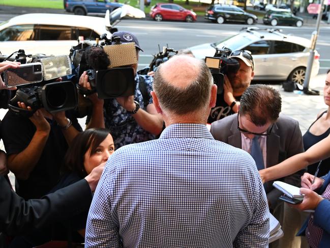 Former Renewal SA chief executive John Hanlon issues a statement outside the Adelaide Magistrates Court. Picture: AAP Image/David Mariuz