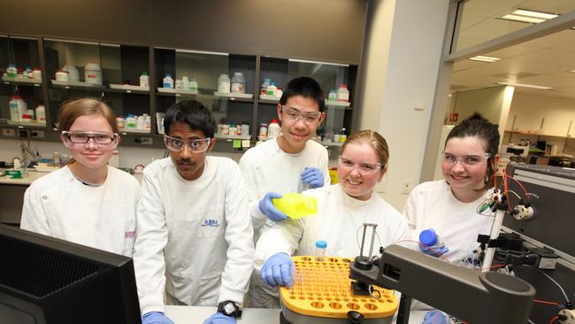 QASMT students at the Australian Institute for Bioengineering and Nanotechnology. Laura Boyle, Archie Mukherjee, Jackson Huang, Grace Solas and Madison Phillips get in some off-site experience. QASMT parents say the Academy was always meant to be near a university.