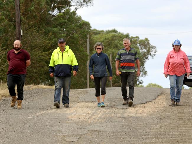 Masons Rd residents John Dagher, Nick Bozinovski, Tina Marshall, John Baird and Kim Filmer.