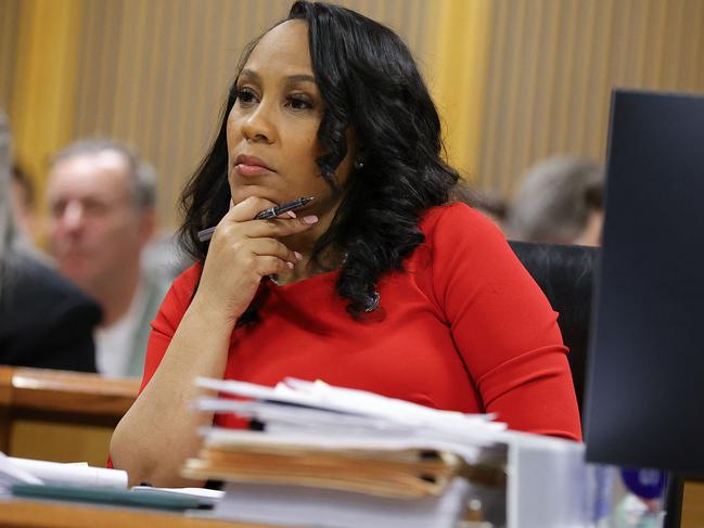 Fulton County District Attorney Fani Willis listens during the final arguments in her disqualification hearing at the Fulton County Courthouse on March 1, 2024, in Atlanta, Georgia. Fulton County Superior Judge Scott McAfee is considering a motion to disqualify Willis over her romantic relationship with Special Prosecutor Nathan Wade, whom she appointed as special prosecutor in the election interference charges against former Trump. (Photo by Alex Slitz / POOL / AFP)