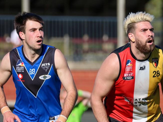 Unley Mercedes' Jack Holliday and Goodwood Saints' Tom Carter. Picture: Brayden Goldspink