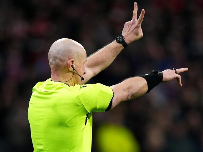 Referee Szymon Marciniak gestures as the penalty kick for Julian Alvarez is ruled out following a VAR review. Picture: Getty Images