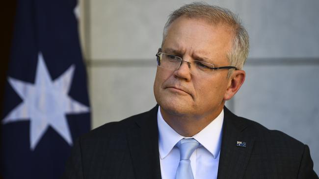 Prime Minister Scott Morrison announces a travel ban on all non-citizens and nonresidents from Friday night. Picture: AAP