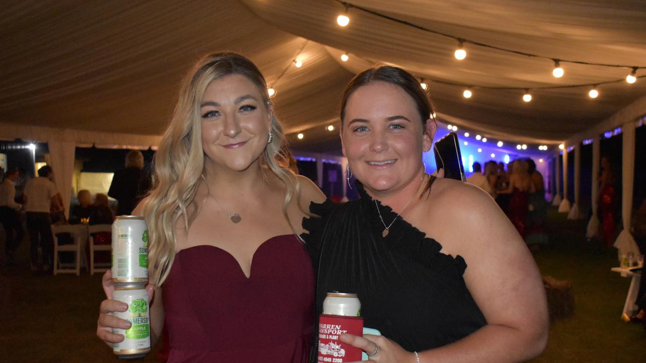 Lily Price of Mackay and Dayna Marshall of Proserpine at the 2021 Proserpine Show Ball. Picture: Kirra Grimes.