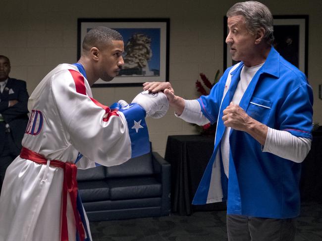 Michael B. Jordan, left, and Sylvester Stallone in a scene from Creed II.