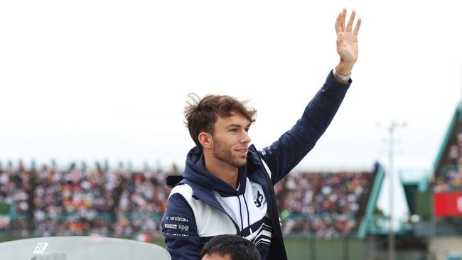 Pierre Gasly waves to the crowd on the drivers parade prior to the F1 Grand Prix. Picture: Getty