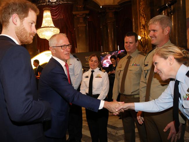 The PM and the prince meet serviceman at the reception at Australia House.