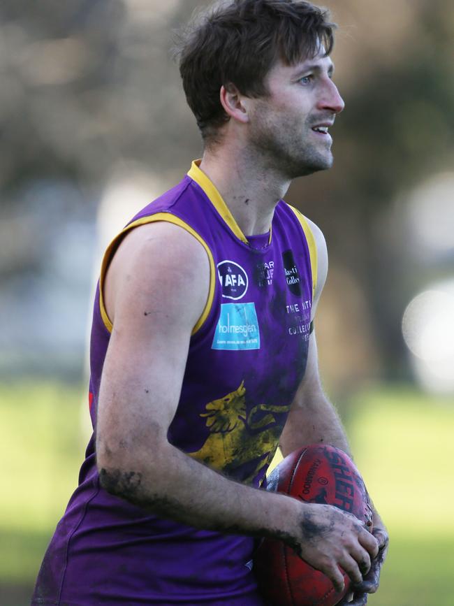 Vivian Michie with the ball for Collegians. Picture: Stuart Milligan