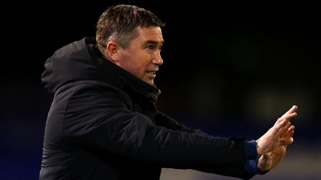 OLDHAM, ENGLAND - FEBRUARY 23: Harry Kewell, Manager of Oldham Athletic reacts during the Sky Bet League Two match between Oldham Athletic and Barrow at Boundary Park on February 23, 2021 in Oldham, England. Sporting stadiums around the UK remain under strict restrictions due to the Coronavirus Pandemic as Government social distancing laws prohibit fans inside venues resulting in games being played behind closed doors. (Photo by Charlotte Tattersall/Getty Images)