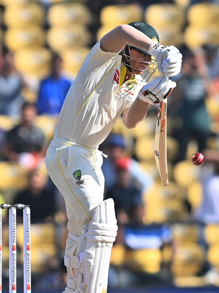 David Warner is under the pump to score runs in the must-win second Test in Delhi. (Photo by Indranil MUKHERJEE / AFP)