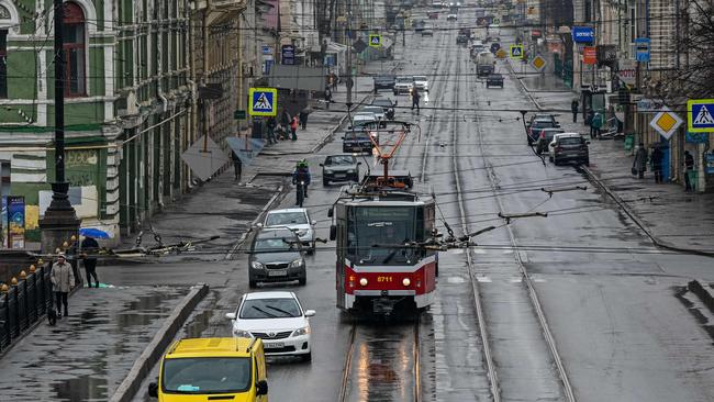 A tram moves along a street of Kharkiv after the resumption of urban electric transportation services which were halted after a massive missile attack in the city.