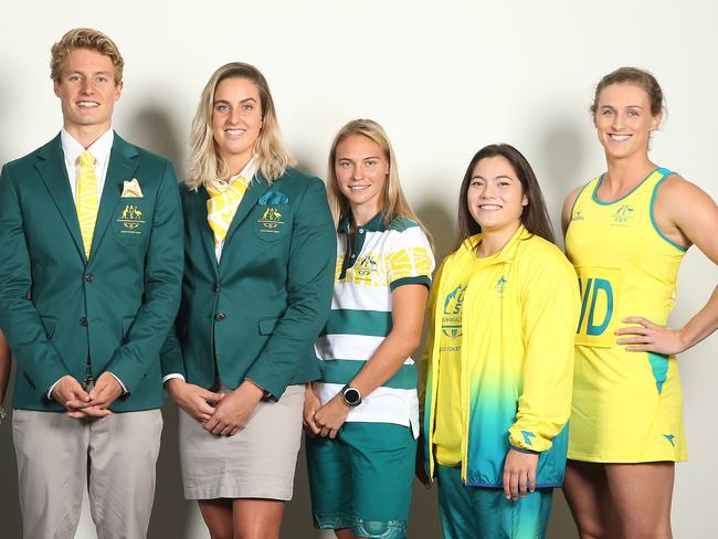 GOLD COAST, AUSTRALIA - FEBRUARY 02: Left to right, Australian Athletes Nic Beveridge (para-triathlon), Dom Bedggood (diving), Matt Hauser (triathlon), Britany Elmslie (swimming), Torita Blake (athletics), Georgia Godwin (gymnastics), and Gabi Simpson (netball) pose during the Australian Commonwealth Games Team Uniform Launch at The Star on February 2, 2018 in Gold Coast, Australia. (Photo by Jono Searle/Getty Images)