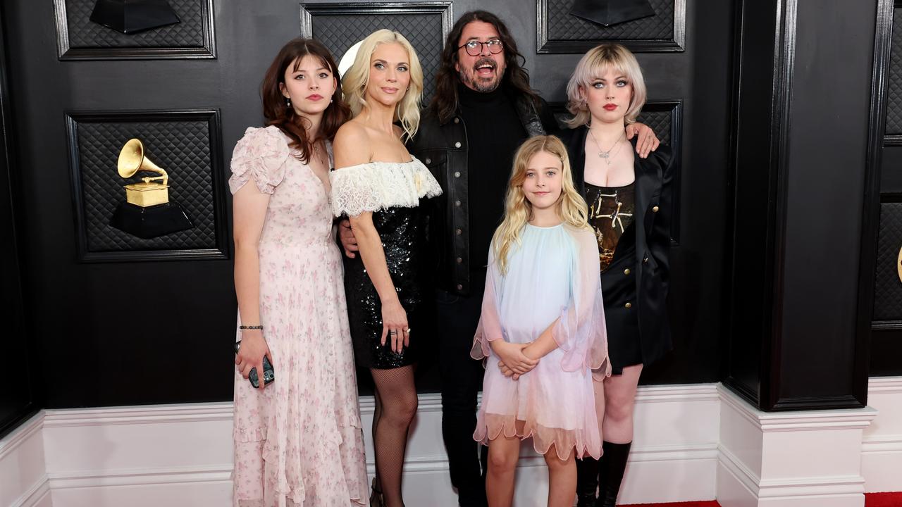 Grohl with his wife Jordyn Blum and daughters (left to right) Harper, Ophelia and Violet. Picture: Amy Sussman/Getty Images