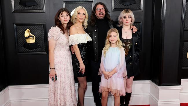 Grohl with his wife Jordyn Blum and daughters (left to right) Harper, Ophelia and Violet. Picture: Amy Sussman/Getty Images