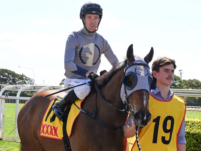 Ronnie Stewart rounds out a winning double at Doomben aboard Hell. Picture: Grant Peters - Trackside Photography