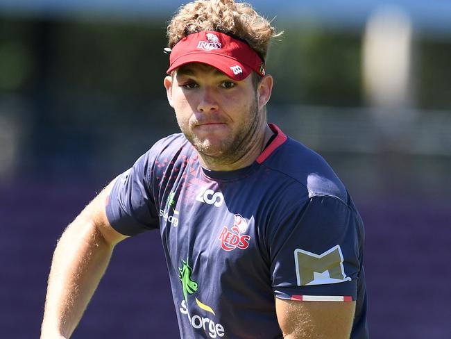 Queensland Reds player Angus Scott-Young helped his side to an upset win over the Brumbies.