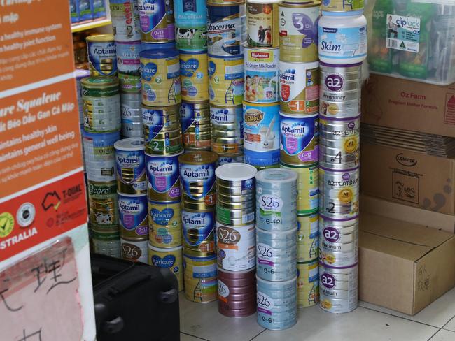 Various brands of baby formula stacked inside the store. Picture: David Swift