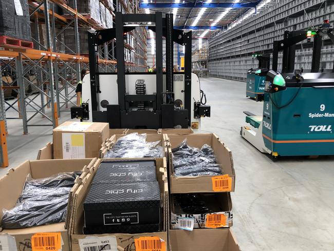 Automated driverless forklift trucks are named after superheroes, like Spider Man&gt; Pictures: Benedict Brook.