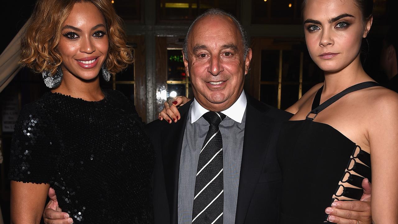 Beyoncé Knowles, with Sir Philip Green and Cara Delevingne at a Topshop in New York, later bought out Arcadia’s share of her Ivy Park company. Picture: Dimitrios Kambouris/Getty