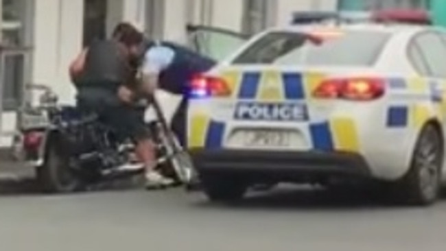 The take-down in all its glory. A NZ cop takes down a biker.