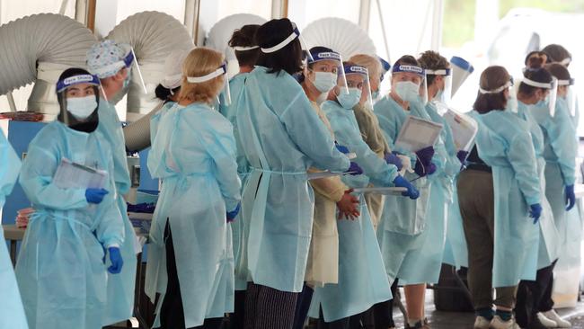 A large amount of medical staff are seen at the testing at the Parkdale site for COVID on Sunday. Picture: David Crosling