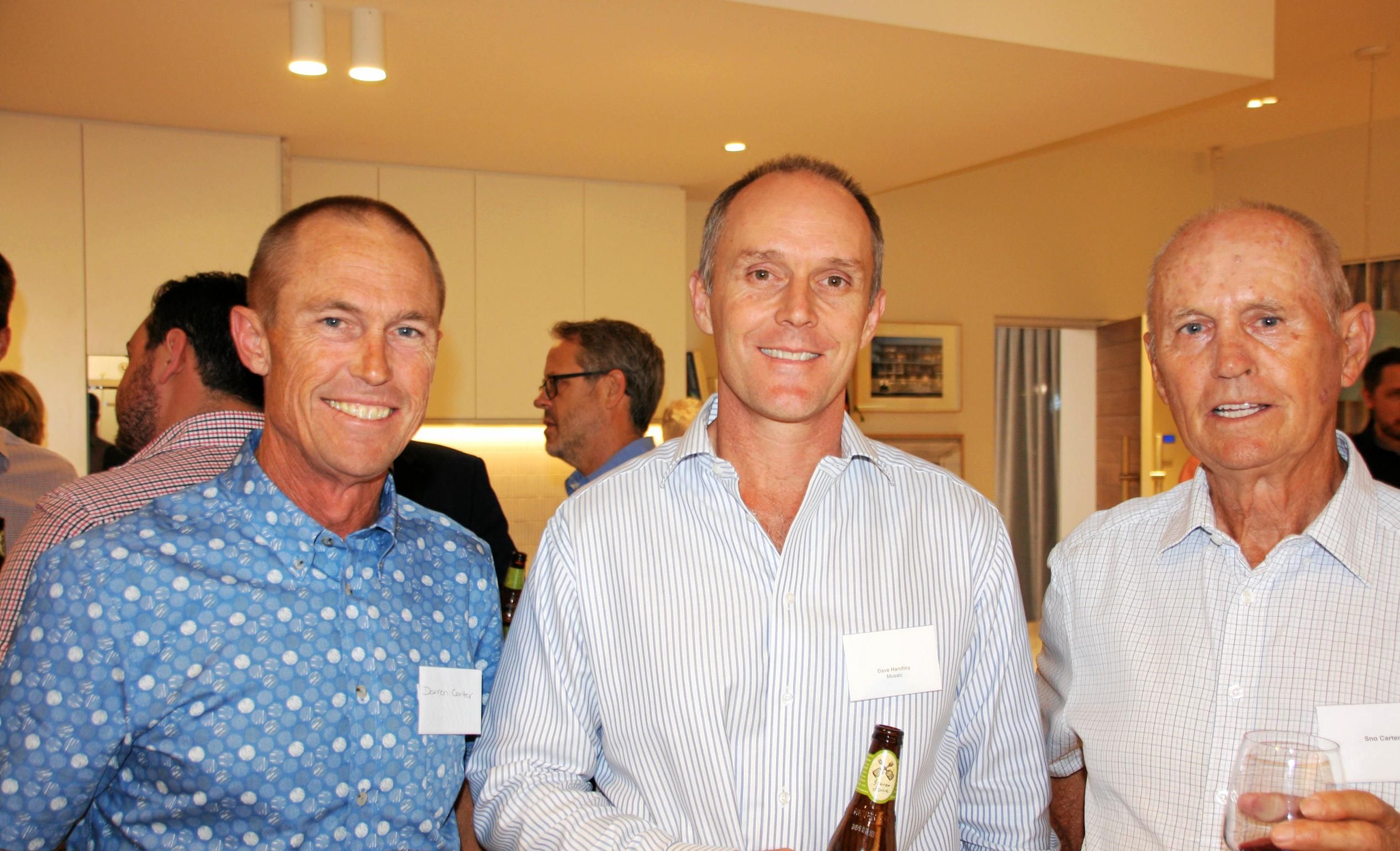 Darren and Sno Carter of Computercut Signs with Dave Handley of Mosaic Property Group at the opening of the company's new Sunshine Coast office at Duporth Avenue, Maroochydore. Picture: Erle Levey