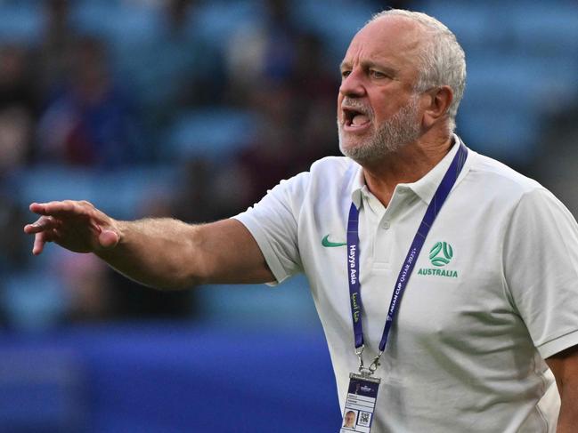(FILES) Australia's coach Graham Arnold reacts during the Qatar 2023 AFC Asian Cup Group B football match between Australia and Uzbekistan at the Al-Janoub Stadium in Al-Wakrah, south of Doha on January 23, 2024. Graham Arnold has quit as coach of the Socceroos, Football Australia said on September 20, 2024, following a poor start to the third round of qualifying for the 2026 World Cup. (Photo by HECTOR RETAMAL / AFP)