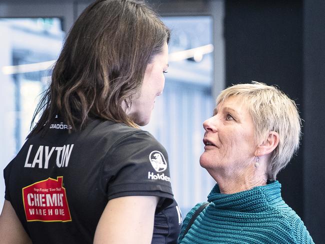 Sharni Layton is embraced by her mother Karen after announcing her retirement