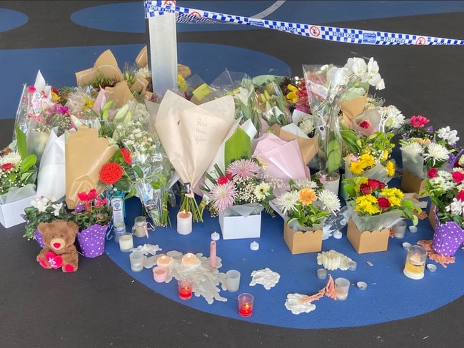 Flowers left at the scene on Monday.