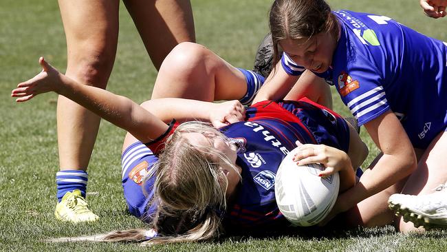 Collegians’ Imogen Lowe gets over the line to score a try. Picture: John Appleyard