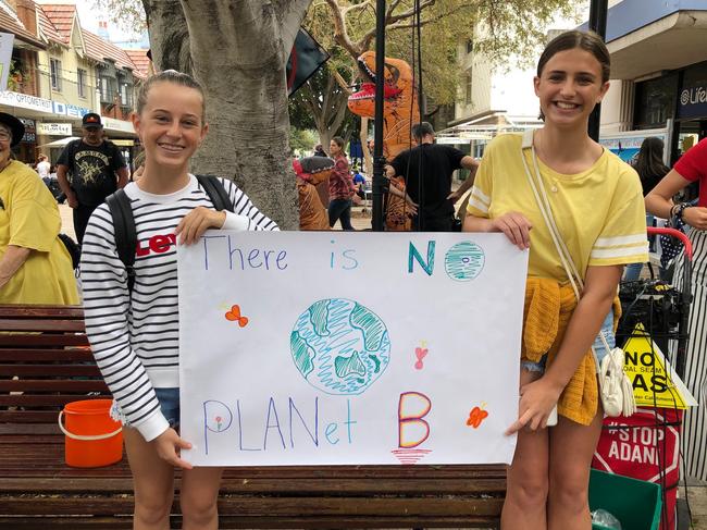 Climate change protest in Manly: Ella Coleman, 13, of Bilgola, and Ruby Drew, 13, of Bilgola, both from Mackellar Girls. Picture: Julie Cross.