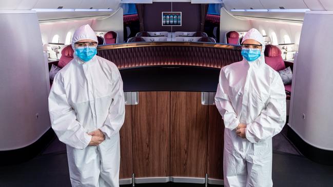 Qatar Airways cabin crew will wear full protective clothing.