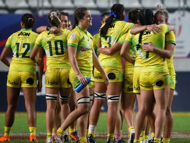 Australia's players celebrate their win over France. Pic: AFP