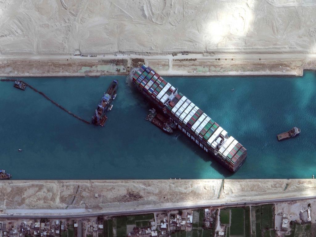 The MV Ever Given container ship spent six days stuck in the Suez Canal, backing up vessels at either end and raising concerns about the impact on global shipping and supply chains. Picture: Satellite image/Maxar Technologies/AFP