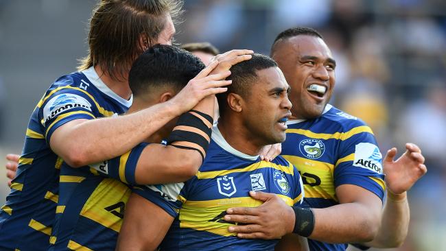 Michael Jennings celebrates a try with his Eels teammates at Bankwest Stadium. Picture: AAP