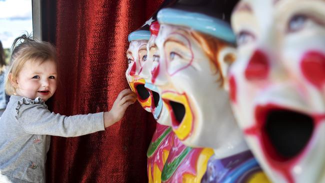 Myra West 3 of Prospect Vale feeds the laughing clowns at the Launceston Show. PICTURE CHRIS KIDD