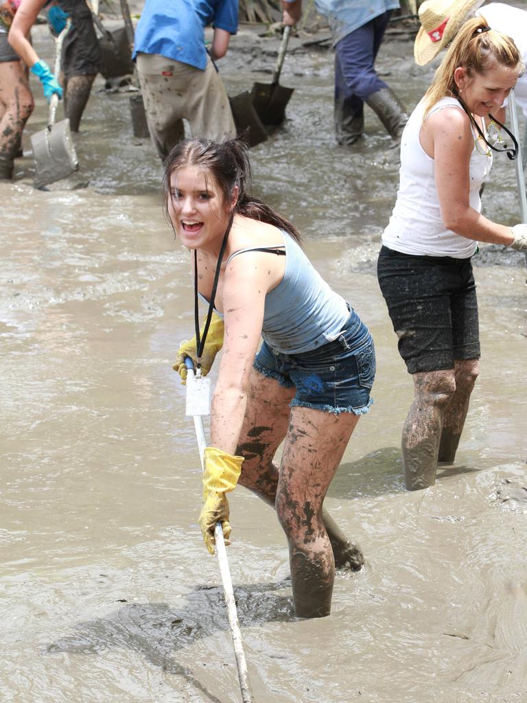 Aspiring Gold Coast model Demi-Lee Bolden wasn't afraid of getting dirty in the 2011 flood clean-up.