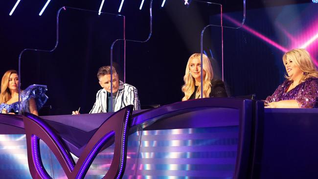 Dannii Minogue. Dave Hughes, Jackie O and Urzila Carlson try to figure out who is behind the mask in the opening episode of Season 3 of The Masked Singer Australia. Picture: Nigel Wright. Picture: Ten