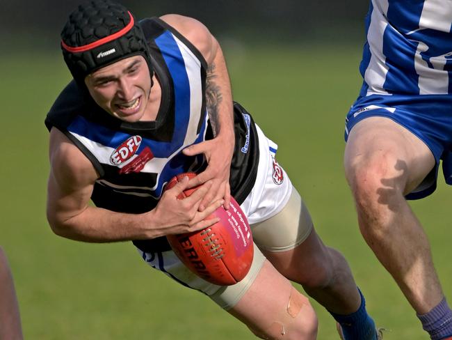 EDFL: Sunbury Kangaroos’ Brody Watts gathers the ball. Picture: Andy Brownbill