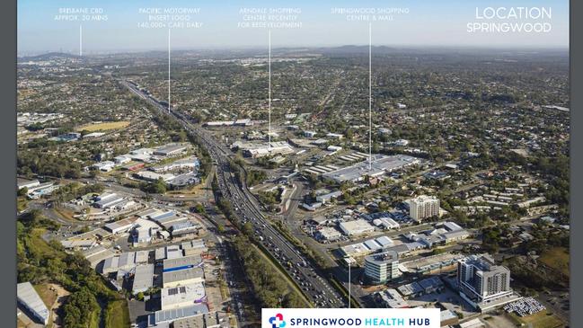 An aerial shot of Springwood pointing out where the $30 million health hub will be located near the M1 and Pacific Motorway.