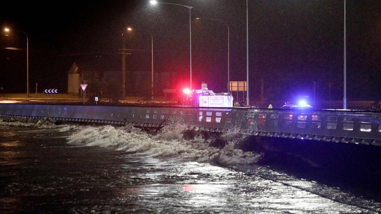 Flood waters have now reached and are going over the Windsor Bridge. Picture: Damian Shaw